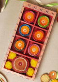 Set of 7 painted clay diyas in a Diwali gift box