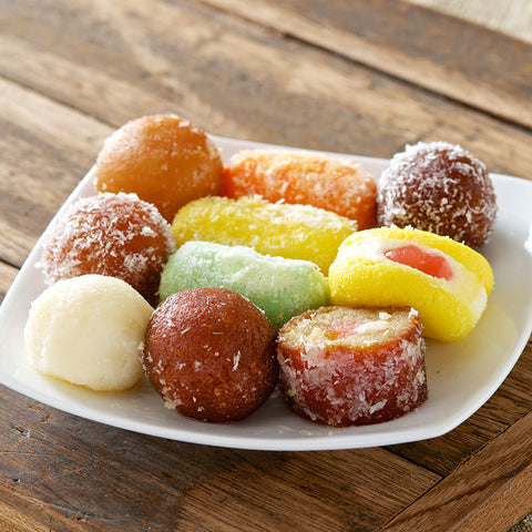 Assorted Bengali mix sweets on a white plate