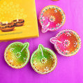 Set of 4 multicolour hand-painted clay diya oil lamps for Diwali
