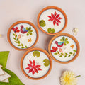 Set of 4 hand-painted decorative terracotta clay diyas for Diwali and puja